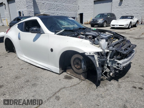 2012 Nissan 370Z z VIN JN1AZ4EH1CM562134, wystawiony jako Copart lot #56708065 z przebiegiem Nie podano mil oraz Szkoda całkowita • Salvage title. Historia ofert i sprzedaży dostępna na DreamBid. Obrazek 4.