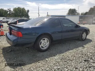 1996 Ford Thunderbird LX z VIN 1FALP62WXTH177910, wystawiony jako Copart lot #70954694 z przebiegiem 86 316 mil mil oraz Szkoda całkowita • Salvage title. Historia ofert i sprzedaży dostępna na DreamBid. Obrazek 3.
