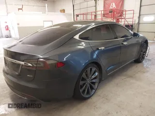 2014 Tesla Model S 60 with VIN 5YJSA1H13EFP49912, listed as a IAAI auction lot 41716661 with 129,776 mi miles and . Bid and sale history available at DreamBid. Image 4.
