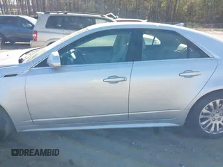 2013 Cadillac CTS Premium with VIN 1G6DP5E33D0175817, listed as a IAAI auction lot 41882197 with 116,645 mi miles and . Bid and sale history available at DreamBid. Image 14.