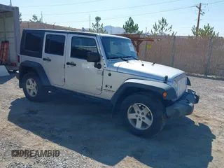 2008 Jeep Wrangler Unlimited X with VIN 1J4GA39168L592999, listed as a IAAI auction lot 42699909 with 158,128 mi miles and . Bid and sale history available at DreamBid. Image 1.
