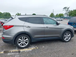 2014 Hyundai Santa Fe z VIN 5XYZW3LA2EG217854, wystawiony jako IAAI lot #42318822 z przebiegiem 120 234 mil mil oraz . Historia ofert i sprzedaży dostępna na DreamBid. Obrazek 13.