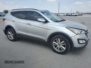 2013 Hyundai Santa Fe Sport z VIN 5XYZUDLA2DG069389, wystawiony jako Copart lot #64054684 z przebiegiem 162 861 mil mil oraz Szkoda całkowita • Salvage title. Historia ofert i sprzedaży dostępna na DreamBid. Obrazek 4.