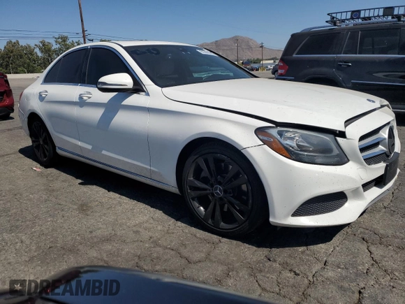 2018 Mercedes-Benz C 300 with VIN 55SWF4JBXJU240593, listed as a Copart auction lot 63388565 with 85,200 mi miles and Salvage title. Bid and sale history available at DreamBid. Image 4.