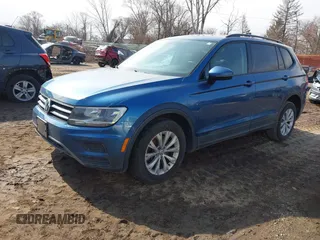 2018 Volkswagen Tiguan S with VIN 3VV1B7AX6JM108786, listed as a IAAI auction lot 41708099 with 162,289 mi miles and . Bid and sale history available at DreamBid. Image 2.