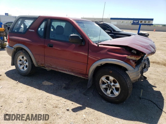 2002 Isuzu Rodeo z VIN 4S2CK57W324328446, wystawiony jako Copart lot #58097174 z przebiegiem 118 514 mil mil oraz Szkoda całkowita • Salvage title. Historia ofert i sprzedaży dostępna na DreamBid. Obrazek 4.