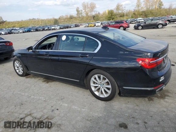 2018 BMW 7 Series 740i xDrive with VIN WBA7E4C54JGV23901, listed as a Copart auction lot 77322824 with 70,922 mi miles and Salvage Title. Bid and sale history available at carsss.com. Image 2.