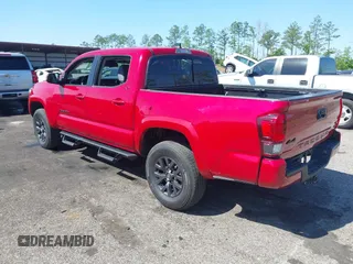 2022 Toyota Tacoma SR with VIN 3TMCZ5AN7NM470900, listed as a IAAI auction lot 42060911 with 38,869 mi miles and . Bid and sale history available at DreamBid. Image 3.