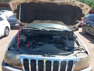 2002 Jeep Grand Cherokee Laredo with VIN 1J4GX48S32C134911, listed as a IAAI auction lot 42323138 with 156,852 mi miles and . Bid and sale history available at DreamBid. Image 10.