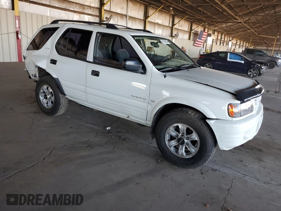 2000 Isuzu Rodeo S z VIN 4S2CK58W3Y4323965, wystawiony jako Copart lot #61189435 z przebiegiem 211 726 mil mil oraz Szkoda całkowita • Salvage title. Historia ofert i sprzedaży dostępna na DreamBid. Obrazek 4.