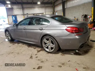 2013 BMW 6 Series 650i xDrive z VIN WBA6B4C56DD098658, wystawiony jako Copart lot #55408535 z przebiegiem 72 964 mil mil oraz Szkoda całkowita • Salvage title. Historia ofert i sprzedaży dostępna na DreamBid. Obrazek 2.