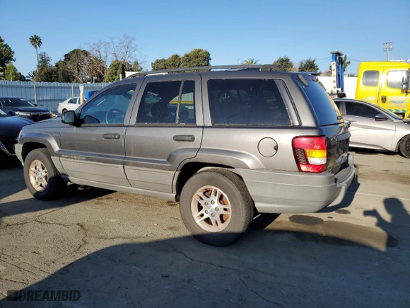 2002 Jeep Grand Cherokee Laredo with VIN 1J4GW48N32C200645, listed as a Copart auction lot 88174715 with 112,129 mi miles and Clean Title. Bid and sale history available at carsss.com. Image 2.