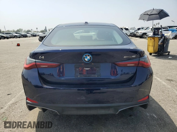 2023 BMW i4 eDrive40 with VIN WBY73AW09PFN76758, listed as a Copart auction lot 48096254 with 9,909 mi miles. Bid and sale history available at carsss.com. Image 6.