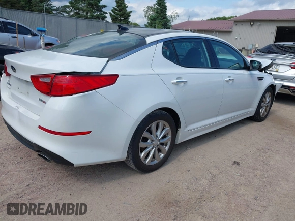 2015 Kia Optima EX with VIN 5XXGN4A77FG497218, listed as a IAAI auction lot 42464839 with 128,355 mi miles and . Bid and sale history available at DreamBid. Image 4.
