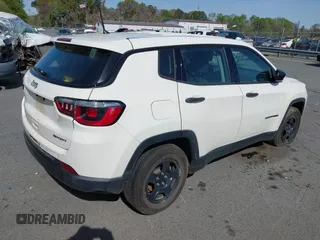 2018 Jeep Compass Sport with VIN 3C4NJCAB1JT151759, listed as a IAAI auction lot 41896340 with 121,804 mi miles. Bid and sale history available at carsss.com. Image 4.
