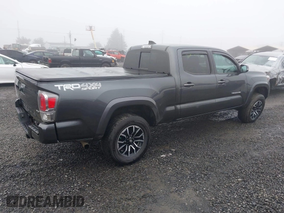 2021 Toyota Tacoma 4WD SR5 with VIN 3TMDZ5BN4MM099423, listed as a IAAI auction lot 41208397 with 62,935 mi miles. Bid and sale history available at carsss.com. Image 4.