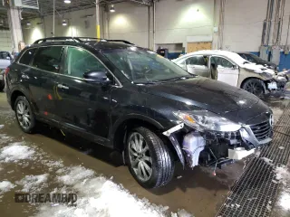 2015 Mazda CX-9 Grand Touring with VIN JM3TB3DV1F0450352, listed as a Copart auction lot 45691345 with 157,889 mi miles and Clean Title. Bid and sale history available at carsss.com. Image 4.