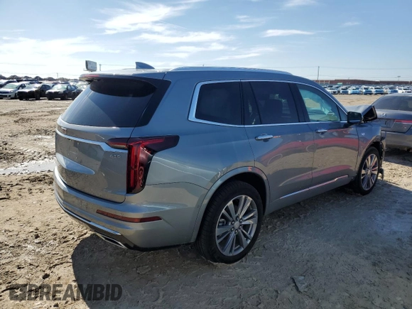 2024 Cadillac XT6 FWD Premium Luxury with VIN 1GYKPCRSXRZ734769, listed as a Copart auction lot 42954995 with 0 mi miles and Salvage Title. Bid and sale history available at carsss.com. Image 3.