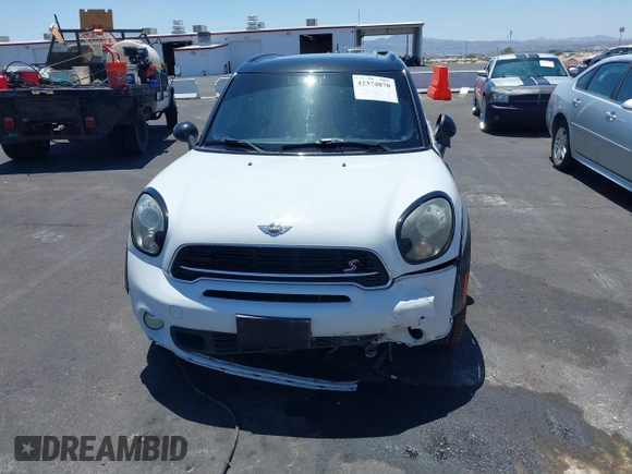 2015 MINI Countryman S with VIN WMWZC3C58FWT05613, listed as a IAAI auction lot 42374870 with 124,214 mi miles and . Bid and sale history available at DreamBid. Image 6.