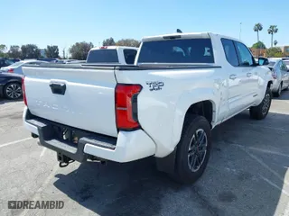 2024 Toyota Tacoma 2WD SR5 with VIN 3TMLB5FN4RM001878, listed as a IAAI auction lot 41815273 with 4,162 mi miles. Bid and sale history available at carsss.com. Image 4.