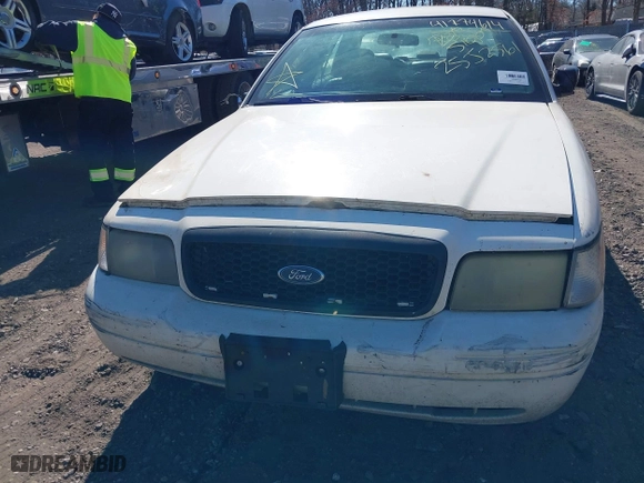 2010 Ford Crown Victoria with VIN 2FABP7AV6AX138688, listed as a IAAI auction lot 41774614 with 999,999 mi miles. Bid and sale history available at carsss.com. Image 11.