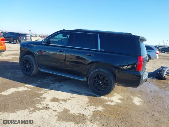 2015 Chevrolet Tahoe LTZ with VIN 1GNSCCKC4FR186632, listed as a IAAI auction lot 41482904 with 149,468 mi miles. Bid and sale history available at carsss.com. Image 15.