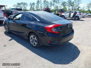 2017 Honda Civic Sedan LX with VIN 19XFC2F57HE061090, listed as a IAAI auction lot 41887402 with 129,167 mi miles. Bid and sale history available at carsss.com. Image 3.