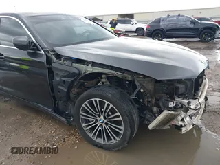 2020 BMW 5 Series 530i with VIN WBAJR3C08LWW77822, listed as a IAAI auction lot 41880376 with 52,533 mi miles and . Bid and sale history available at carsss.com. Image 18.