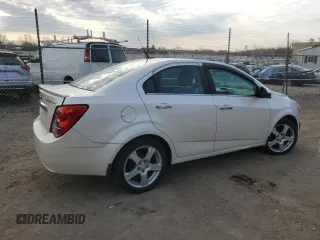 2014 Chevrolet Sonic LTZ with VIN 1G1JE5SH4E4132029, listed as a Copart auction lot 45450305 with 115,173 mi miles and Clean Title. Bid and sale history available at carsss.com. Image 3.