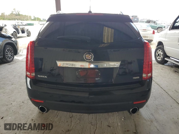 2015 Cadillac SRX Premium Collection with VIN 3GYFNDE38FS596718, listed as a Copart auction lot 56674245 with 106,379 mi miles and Salvage title. Bid and sale history available at DreamBid. Image 6.