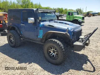2010 Jeep Wrangler Sport with VIN 1J4AA2D11AL218913, listed as a Copart auction lot 53308135 with Not Provided miles and Salvage Title. Bid and sale history available at carsss.com. Image 4.