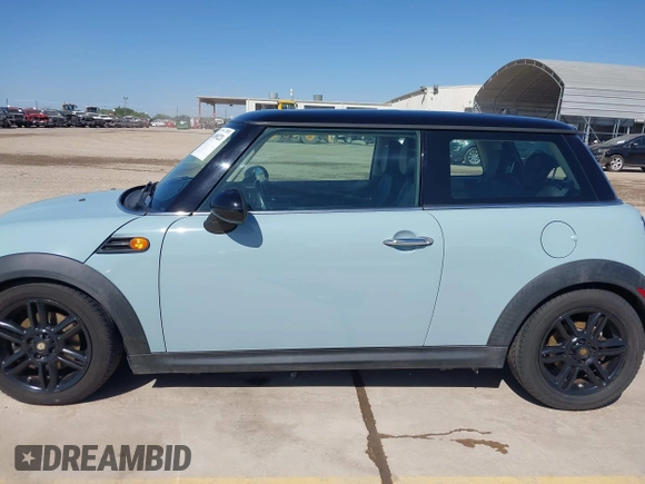 2013 MINI Hardtop with VIN WMWSU3C57DT690398, listed as a IAAI auction lot 41989221 with 112,954 mi miles and . Bid and sale history available at DreamBid. Image 14.