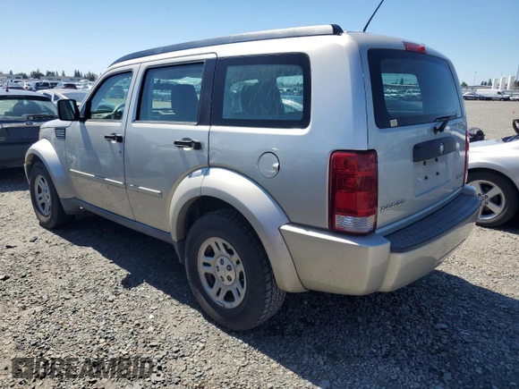 2009 Dodge Nitro SE z VIN 1D8GT28K19W541402, wystawiony jako Copart lot #57487874 z przebiegiem 189 653 mil mil oraz Szkoda całkowita • Salvage title. Historia ofert i sprzedaży dostępna na DreamBid. Obrazek 2.