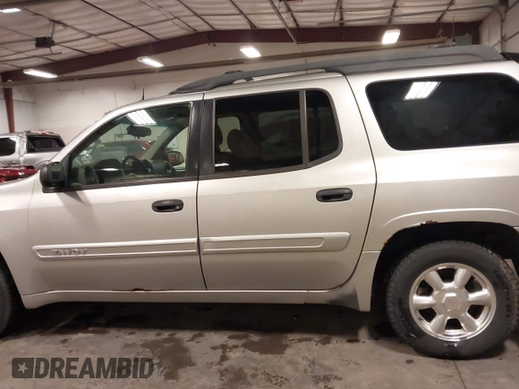 2005 GMC Envoy SLE with VIN 1GKET16S656102522, listed as a IAAI auction lot 41729310 with 233,049 mi miles. Bid and sale history available at carsss.com. Image 15.