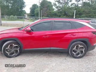 2022 Hyundai Tucson SEL z VIN 5NMJF3AE5NH135237, wystawiony jako IAAI lot #42324113 z przebiegiem 44 077 mil mil oraz . Historia ofert i sprzedaży dostępna na DreamBid. Obrazek 14.