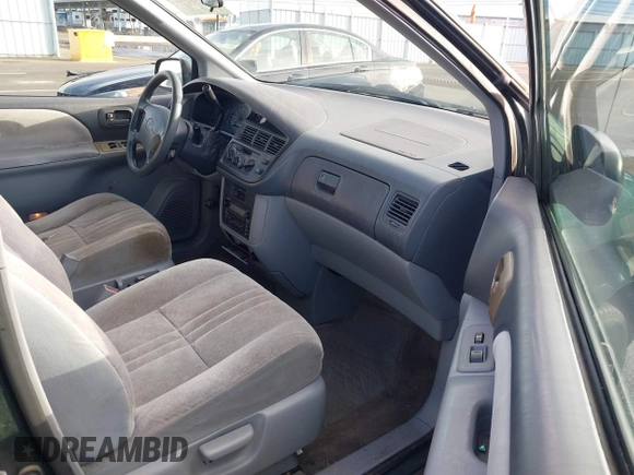 2000 Toyota Sienna CE with VIN 4T3ZF19C6YU220808, listed as a IAAI auction lot 41250496 with 222,812 mi miles. Bid and sale history available at carsss.com. Image 5.
