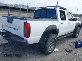2002 Nissan Frontier SE with VIN 1N6ED27T22C355126, listed as a IAAI auction lot 41547453 with 183,125 mi miles and . Bid and sale history available at DreamBid. Image 4.