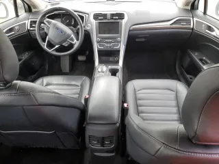 2018 Ford Fusion SE z VIN 3FA6P0LU0JR171651, wystawiony jako Copart lot #58311204 z przebiegiem 124 785 mil mil oraz Czysty tytuł • Clean title. Historia ofert i sprzedaży dostępna na DreamBid. Obrazek 8.