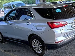 2020 Chevrolet Equinox LT z VIN 2GNAXJEV5L6230548, wystawiony jako IAAI lot #42573168 z przebiegiem 95 519 mil mil oraz . Historia ofert i sprzedaży dostępna na DreamBid. Obrazek 6.