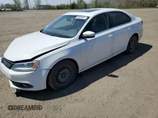 2012 Volkswagen Jetta SEL с VIN 3VWLX7AJ4CM409979, выставлен на аукционе Copart как лот 56939385 с пробегом 230 091 миль миль и Списание • Salvage title. История ставок и продаж доступна на DreamBid. Изображение 1.