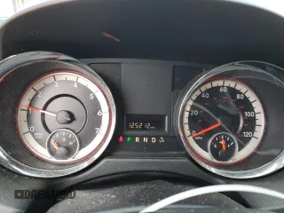 2014 Dodge Grand Caravan SXT with VIN 2C4RDGCG4ER114464, listed as a Copart auction lot 52480965 with 125,212 mi miles and Salvage Title. Bid and sale history available at DreamBid. Image 9.