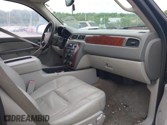 2012 Chevrolet Tahoe LT with VIN 1GNSCBE05CR211898, listed as a IAAI auction lot 42612993 with 233,367 mi miles and . Bid and sale history available at DreamBid. Image 5.