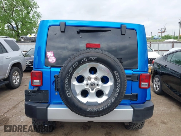 2015 Jeep Wrangler Sahara with VIN 1C4AJWBG9FL663959, listed as a IAAI auction lot 42133900 with 56,253 mi miles and . Bid and sale history available at DreamBid. Image 17.