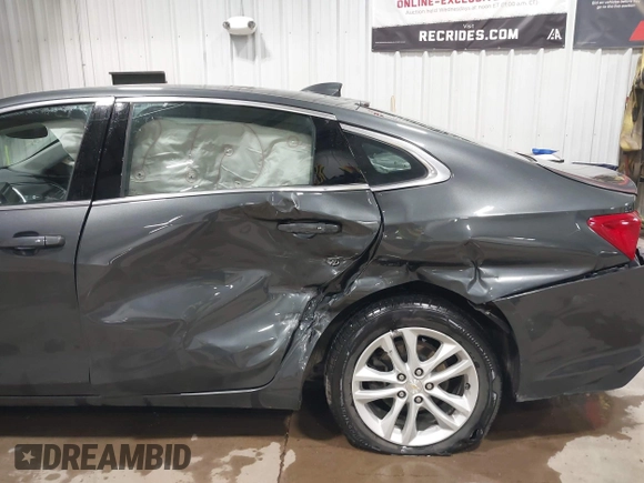 2018 Chevrolet Malibu LT with VIN 1G1ZD5ST9JF158845, listed as a IAAI auction lot 42412518 with 83,301 mi miles and . Bid and sale history available at DreamBid. Image 6.