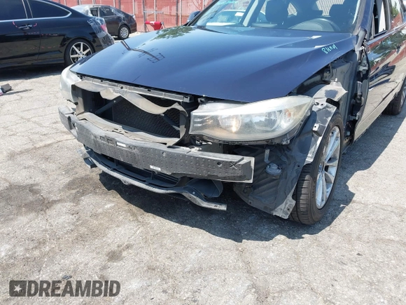 2014 BMW 3 Series 328i Gran Turismo xDrive z VIN WBA3X5C50ED557470, wystawiony jako IAAI lot #42606682 z przebiegiem 172 016 mil mil oraz . Historia ofert i sprzedaży dostępna na DreamBid. Obrazek 6.