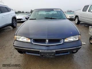 1998 Pontiac Bonneville SE with VIN 1G2HX52K7W4222082, listed as a Copart auction lot 84293574 with 201,575 mi miles and Salvage Title. Bid and sale history available at carsss.com. Image 5.
