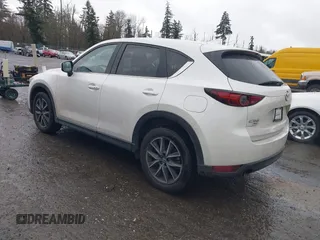 2017 Mazda CX-5 Grand Touring with VIN JM3KFBDL5H0148574, listed as a IAAI auction lot 41867827 with 32,382 mi miles. Bid and sale history available at carsss.com. Image 3.