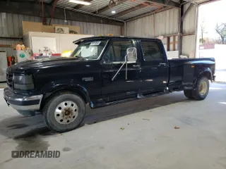 1996 Ford F-350 z VIN 1FTJW35G3TEB71228, wystawiony jako Copart lot #79210564 z przebiegiem 179 497 mil mil oraz Szkody całkowita. Historia ofert i sprzedaży dostępna na DreamBid. Obrazek 1.