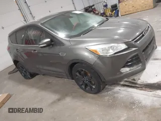 2013 Ford Escape SEL with VIN 1FMCU9H96DUC78548, listed as a IAAI auction lot 41217934 with 213,859 mi miles. Bid and sale history available at carsss.com. Image 1.