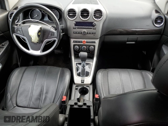 2014 Chevrolet Captiva Sport LTZ with VIN 3GNAL4EK5ES598137, listed as a Copart auction lot 77800804 with 106,893 mi miles and Salvage Title. Bid and sale history available at DreamBid. Image 8.